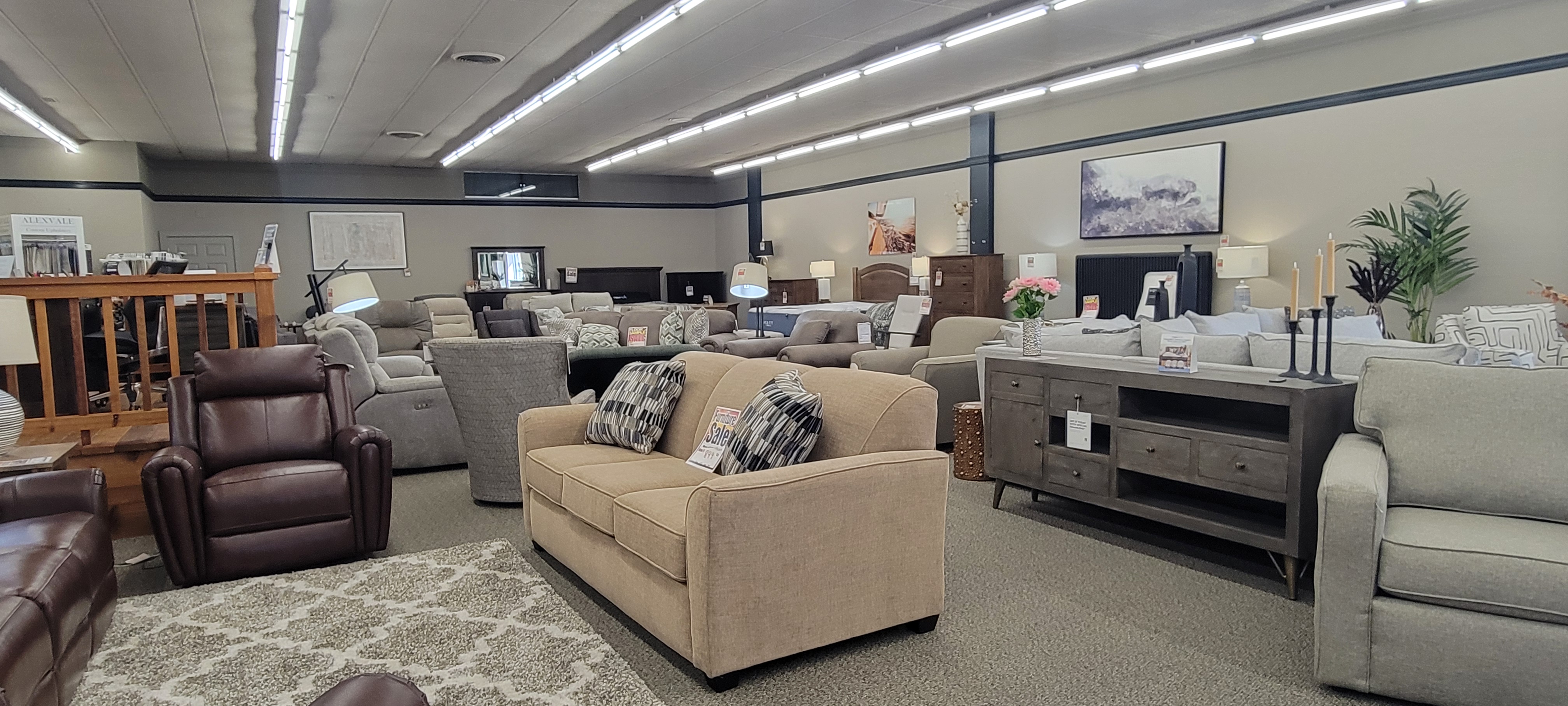 Living room floor with sofas and recliners